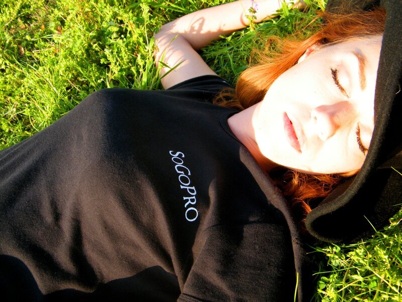 woman resting in grass