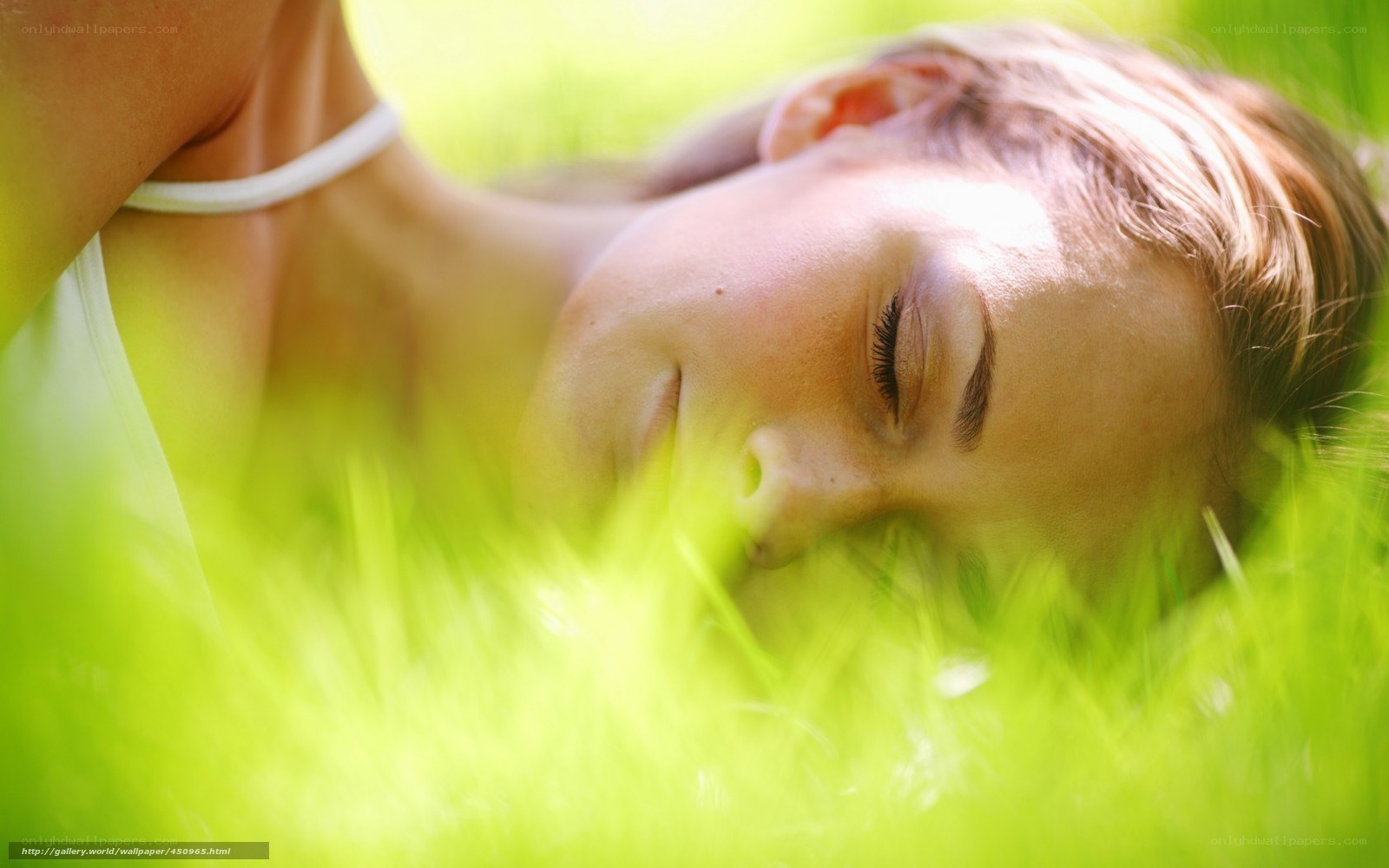 Woman resting in grass
