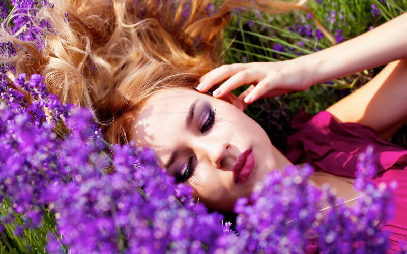 woman resting in lavender field