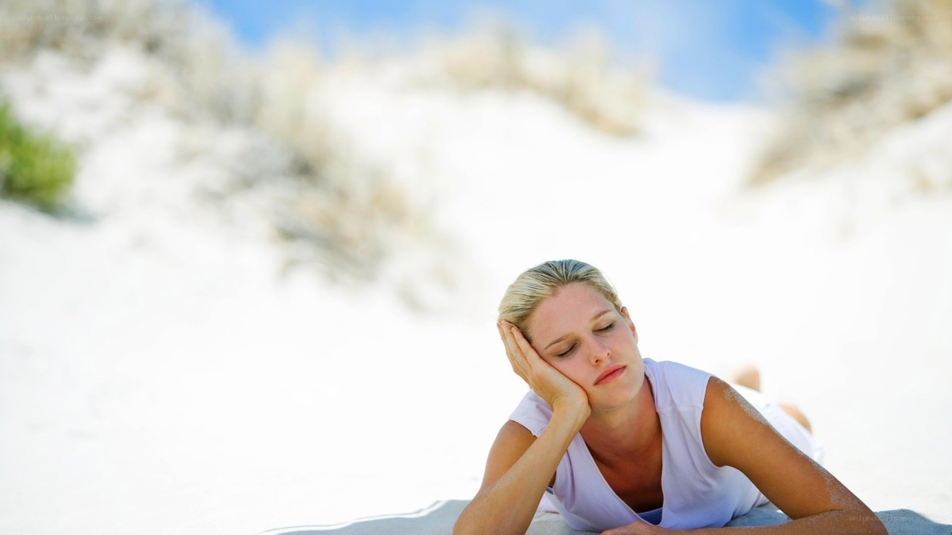 Woman resting on a beach