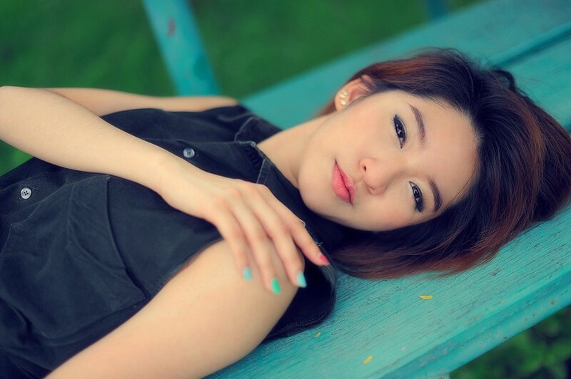 woman resting on a bench
