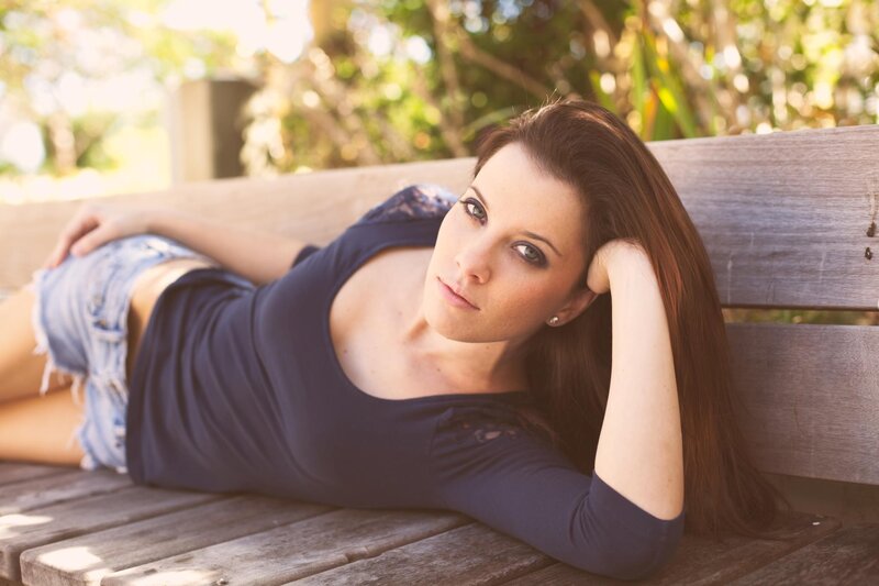 woman resting on a bench