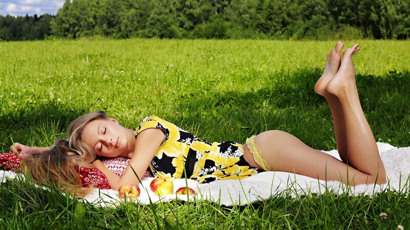 Woman resting on a blanket