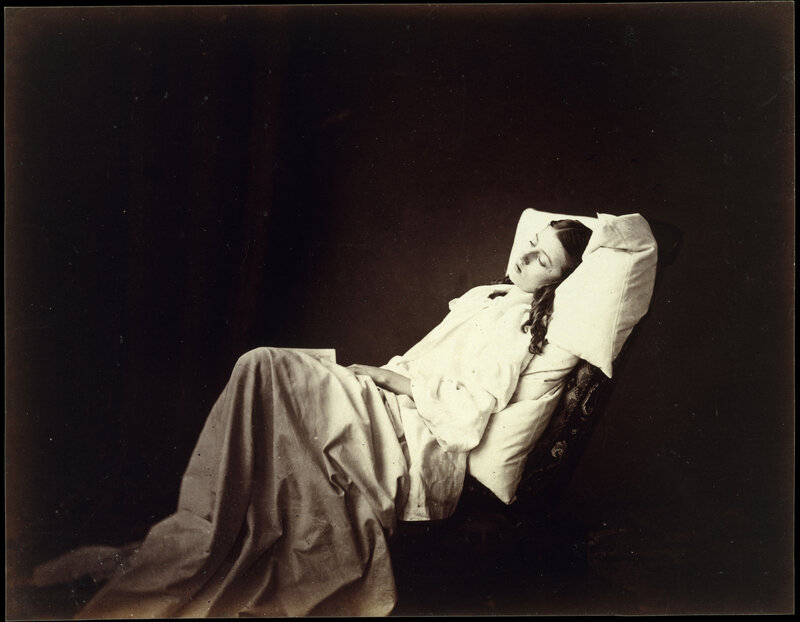Woman resting on a chaise lounge