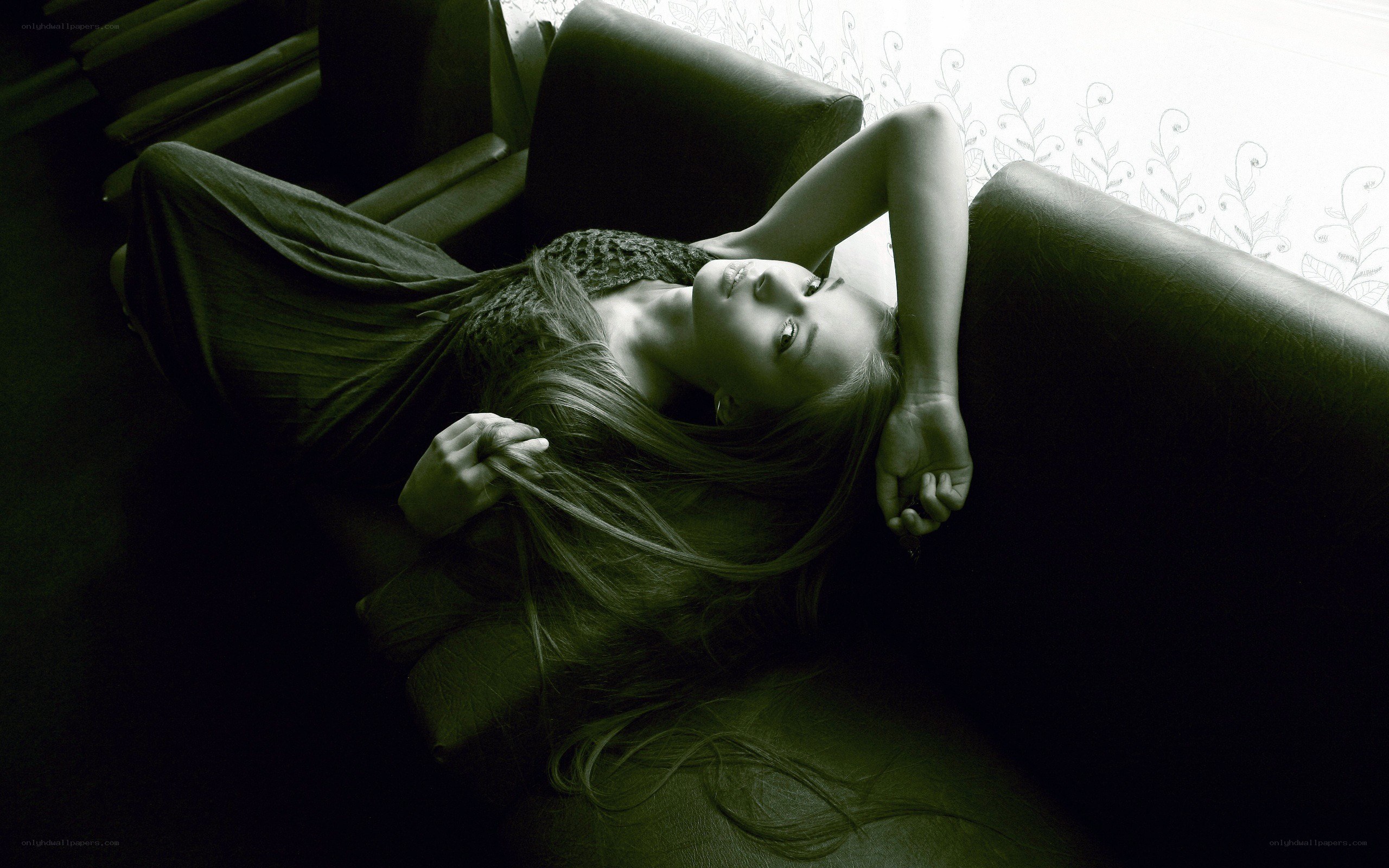 woman resting on a couch