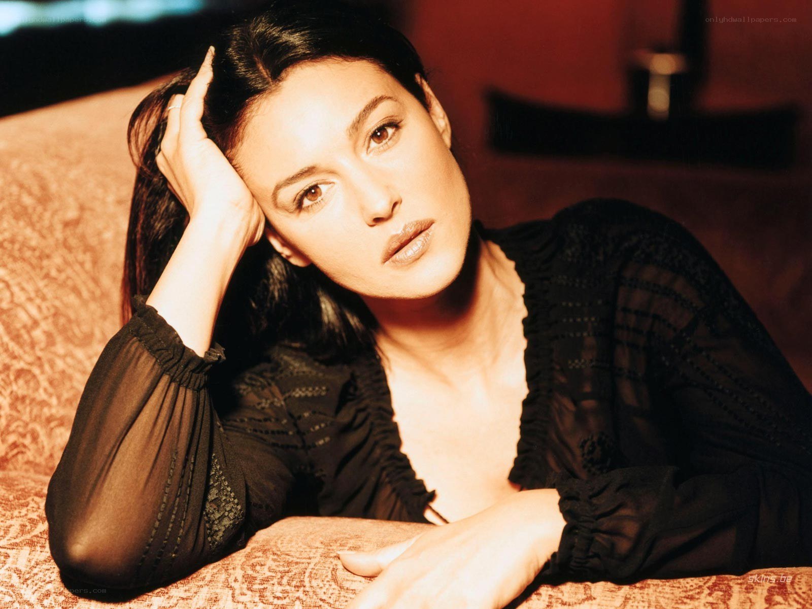 woman resting on a couch