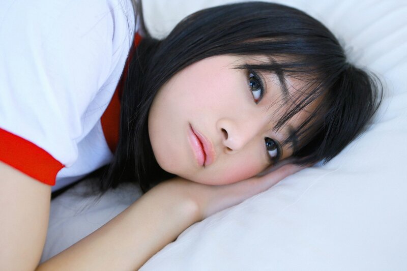woman resting on a pillow