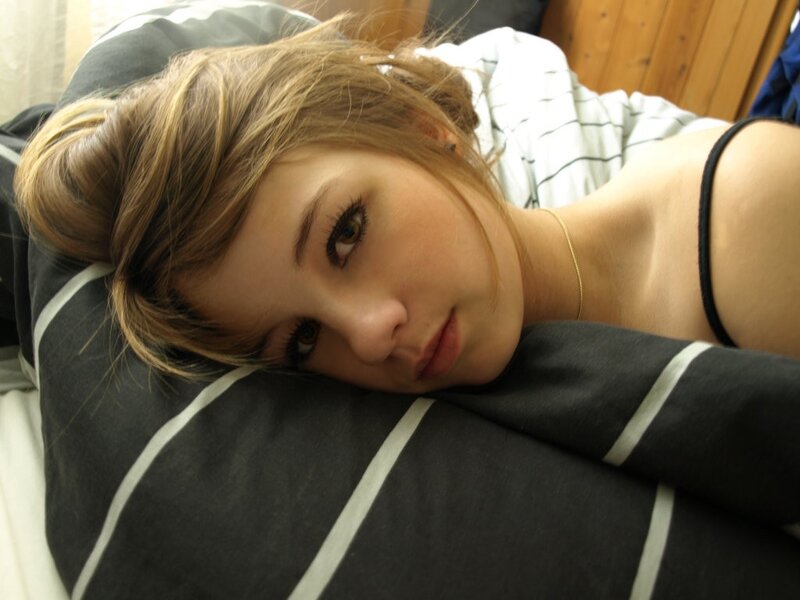 woman resting on a pillow