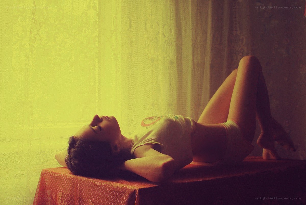 woman resting on a table