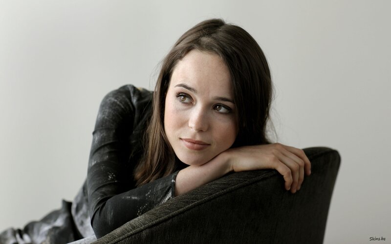 woman resting on armchair