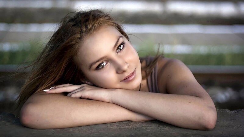 woman resting on arms