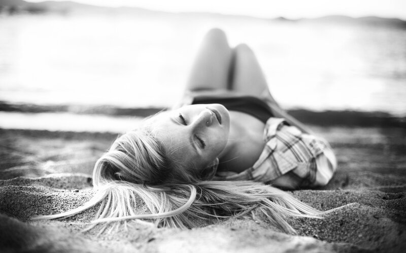 woman resting on beach