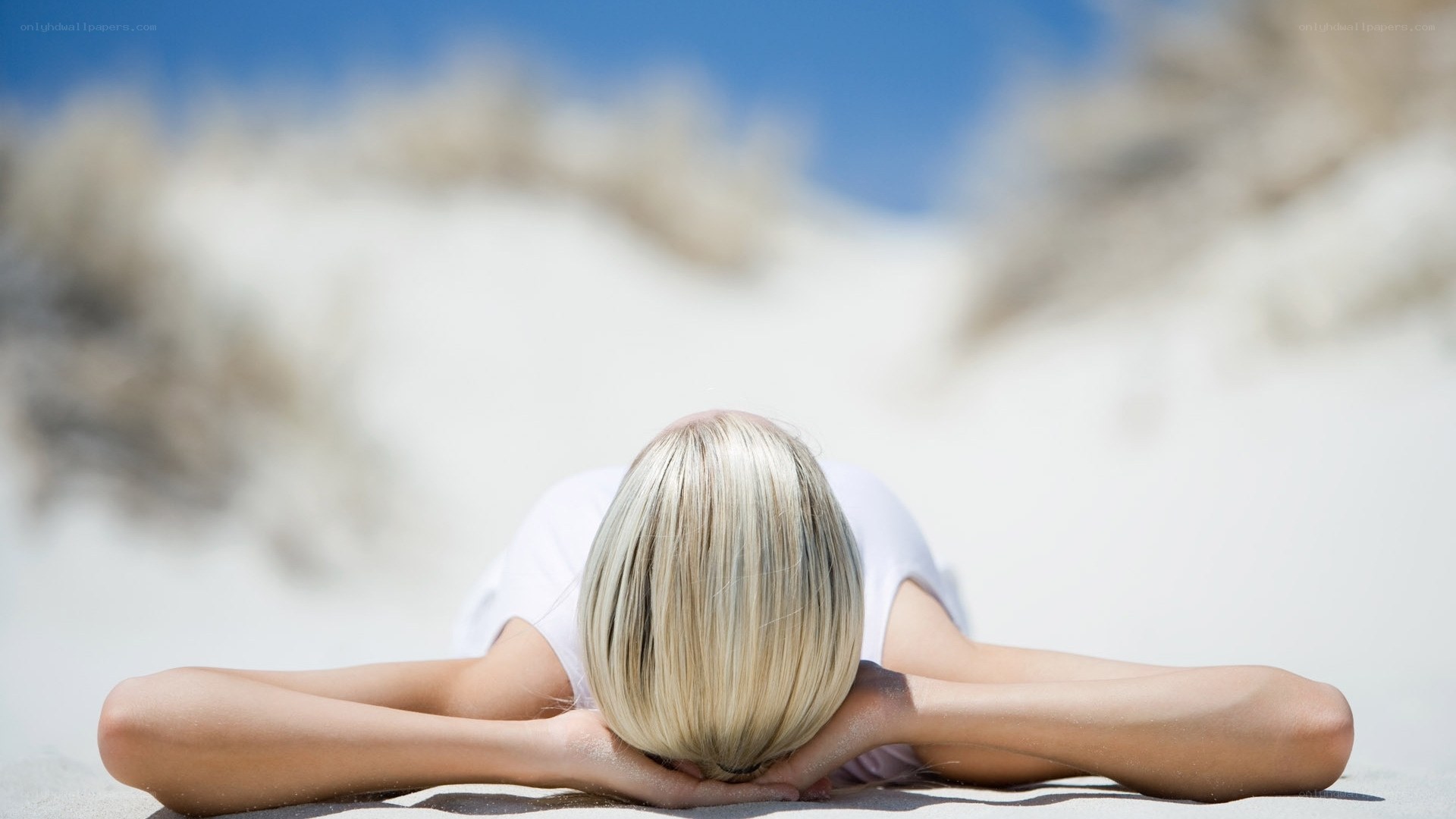 woman resting on beach