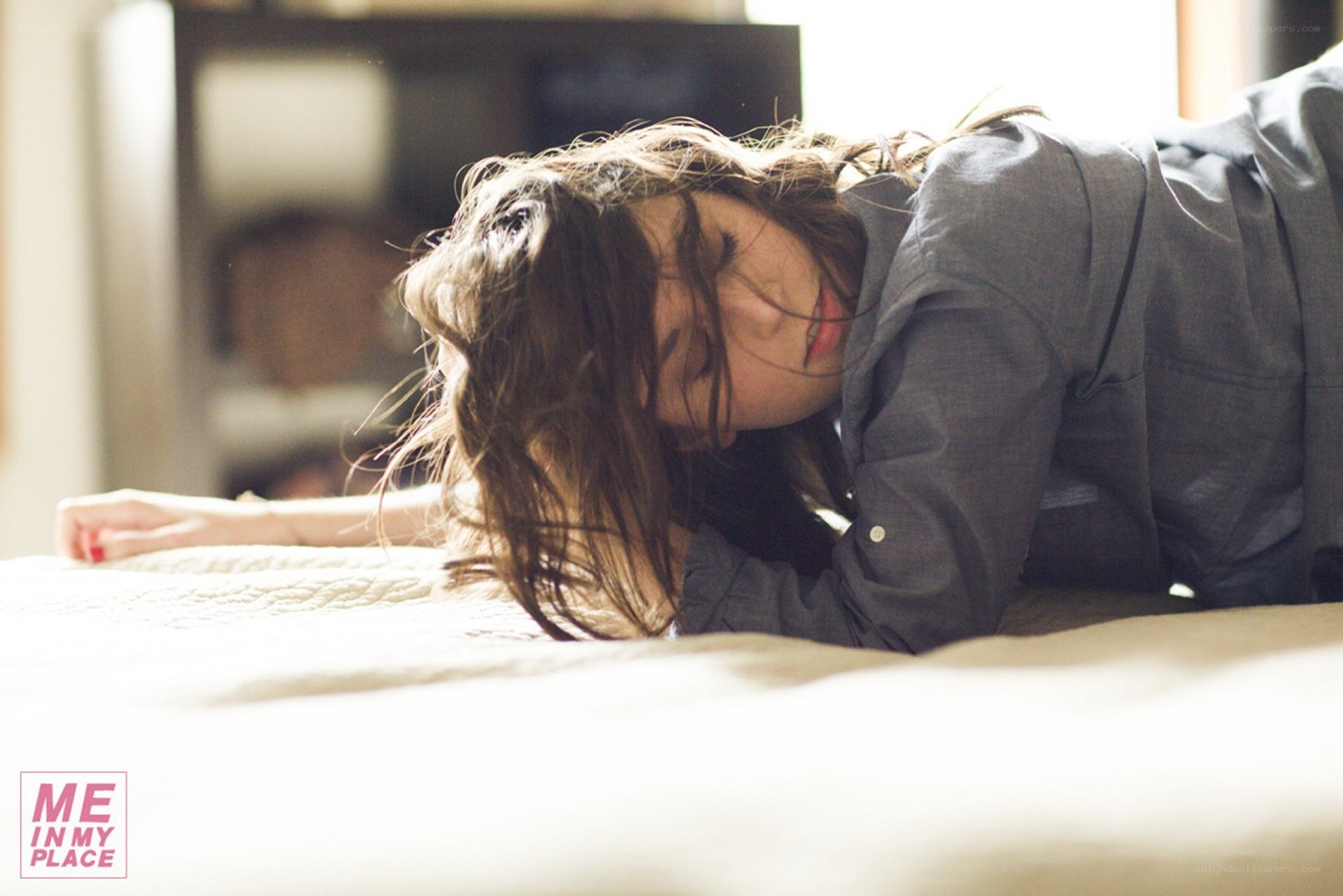 woman resting on bed