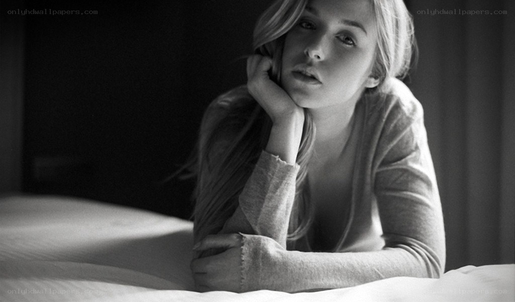 woman resting on bed
