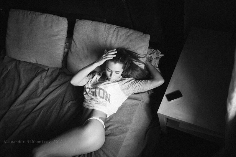 woman resting on bed
