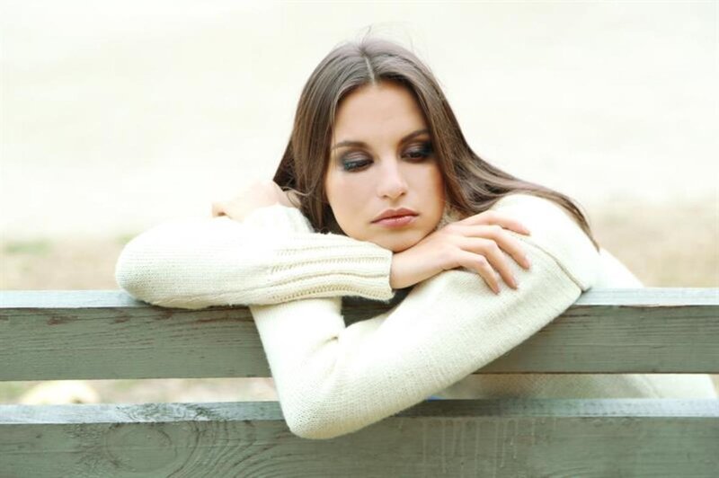 Woman Resting on Bench — White