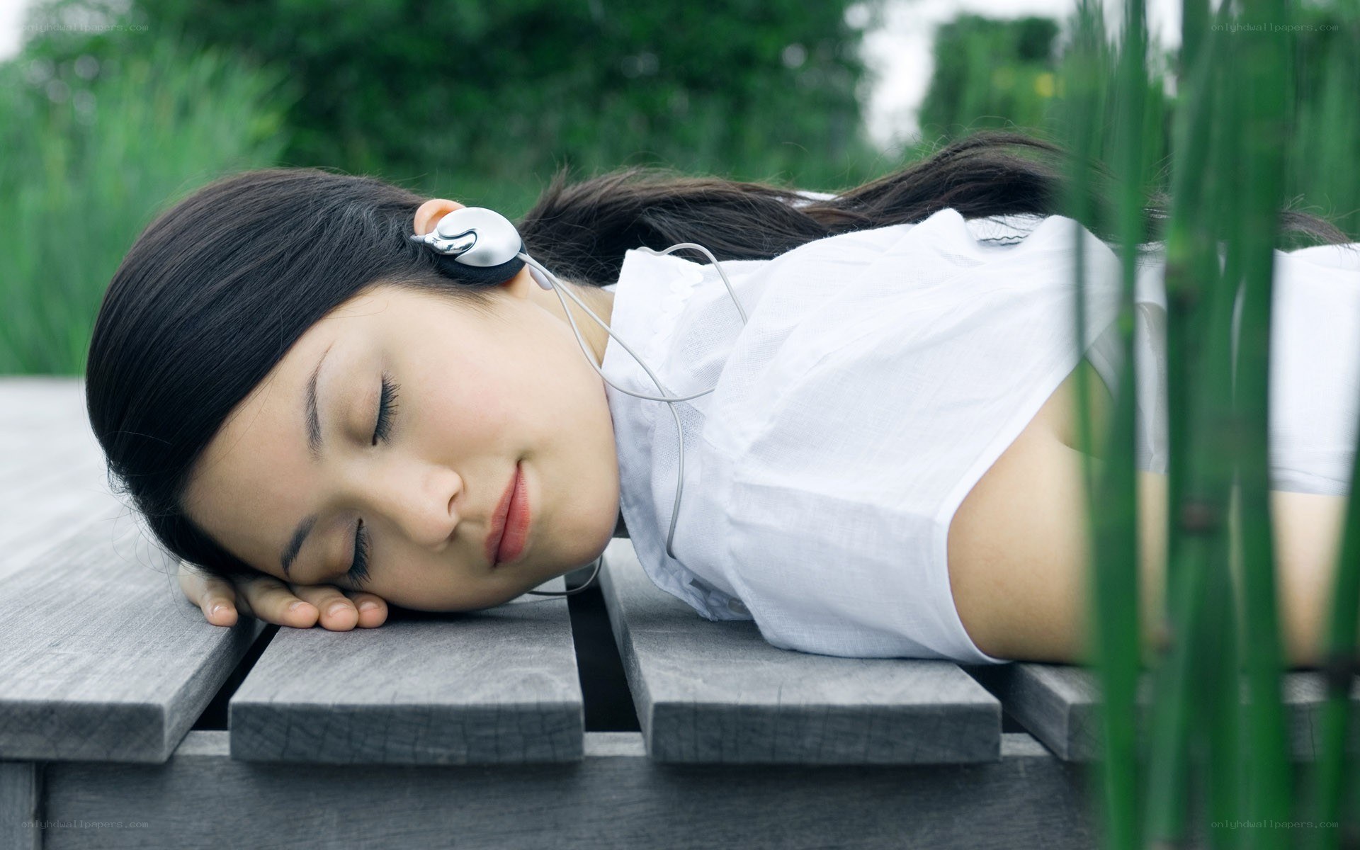 Woman resting on bench