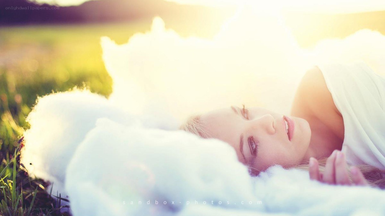 woman resting on clouds