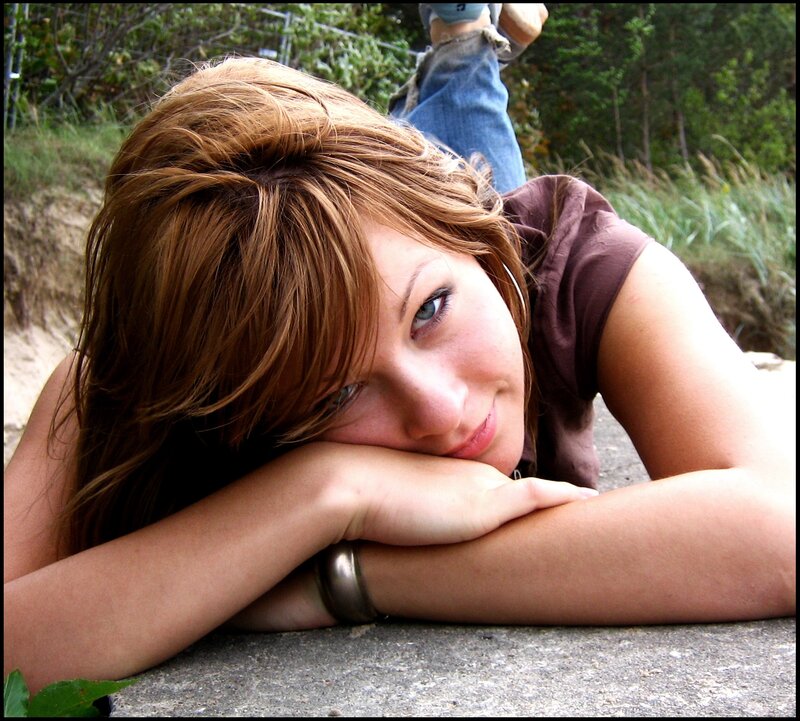 woman resting on concrete