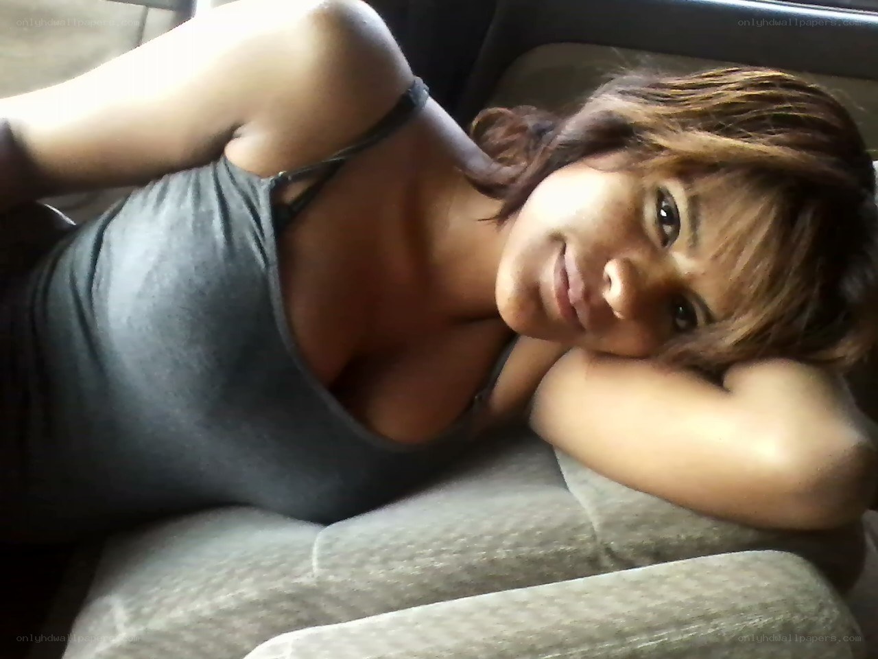 woman resting on couch