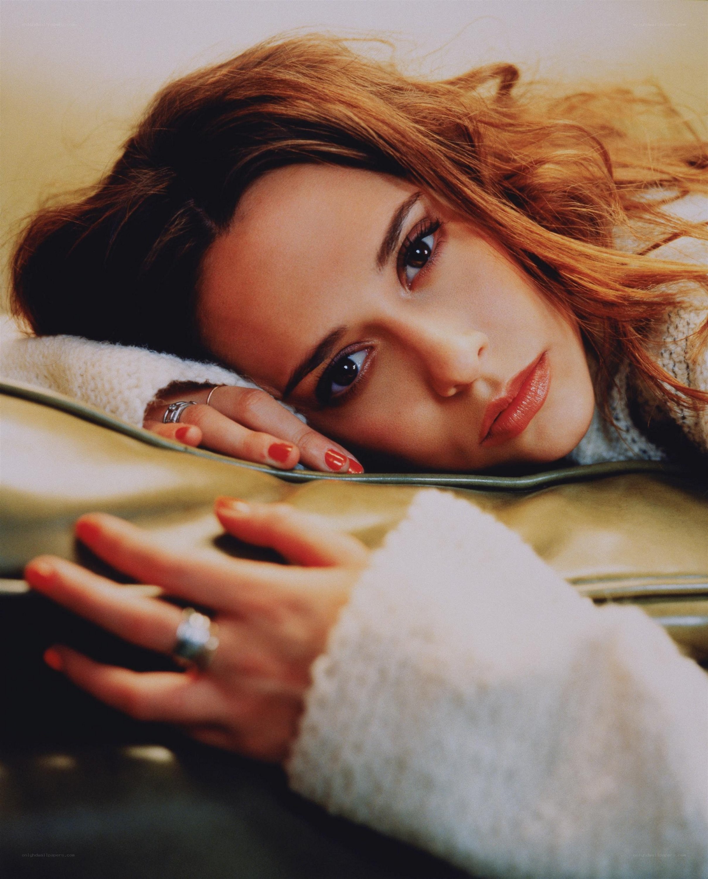 woman resting on couch
