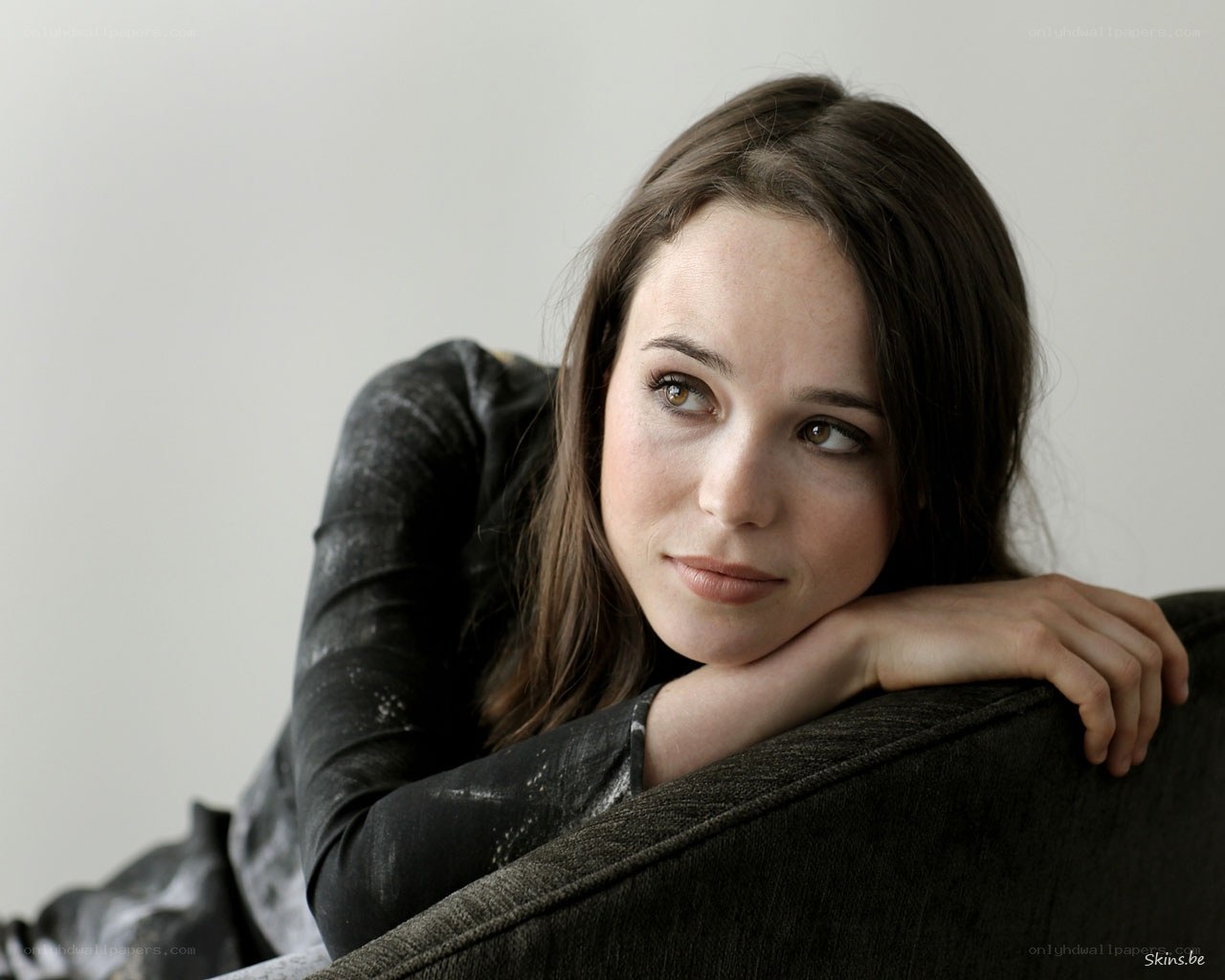 woman resting on couch