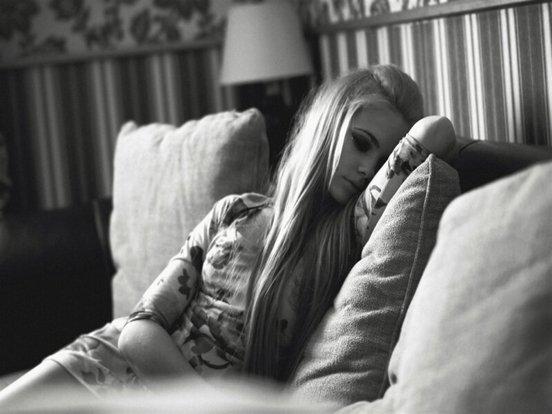 Woman Resting on Couch — Black