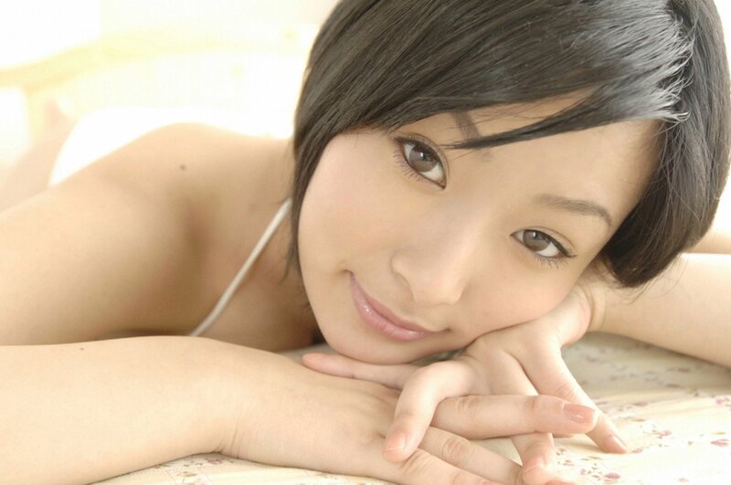 woman resting on floral surface