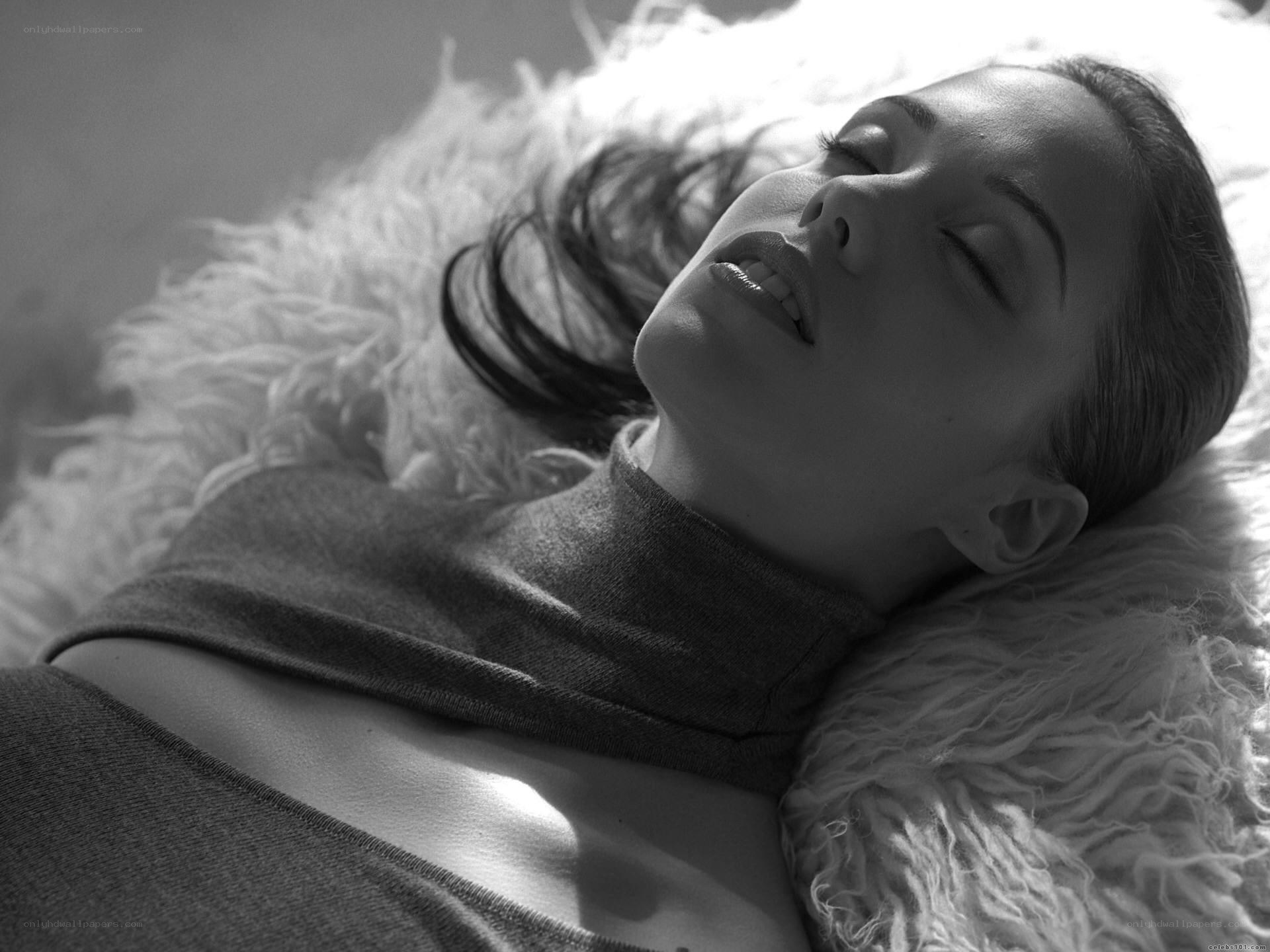 woman resting on fluffy surface