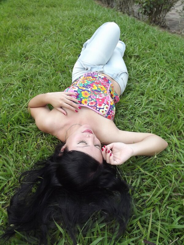 Woman resting on grass