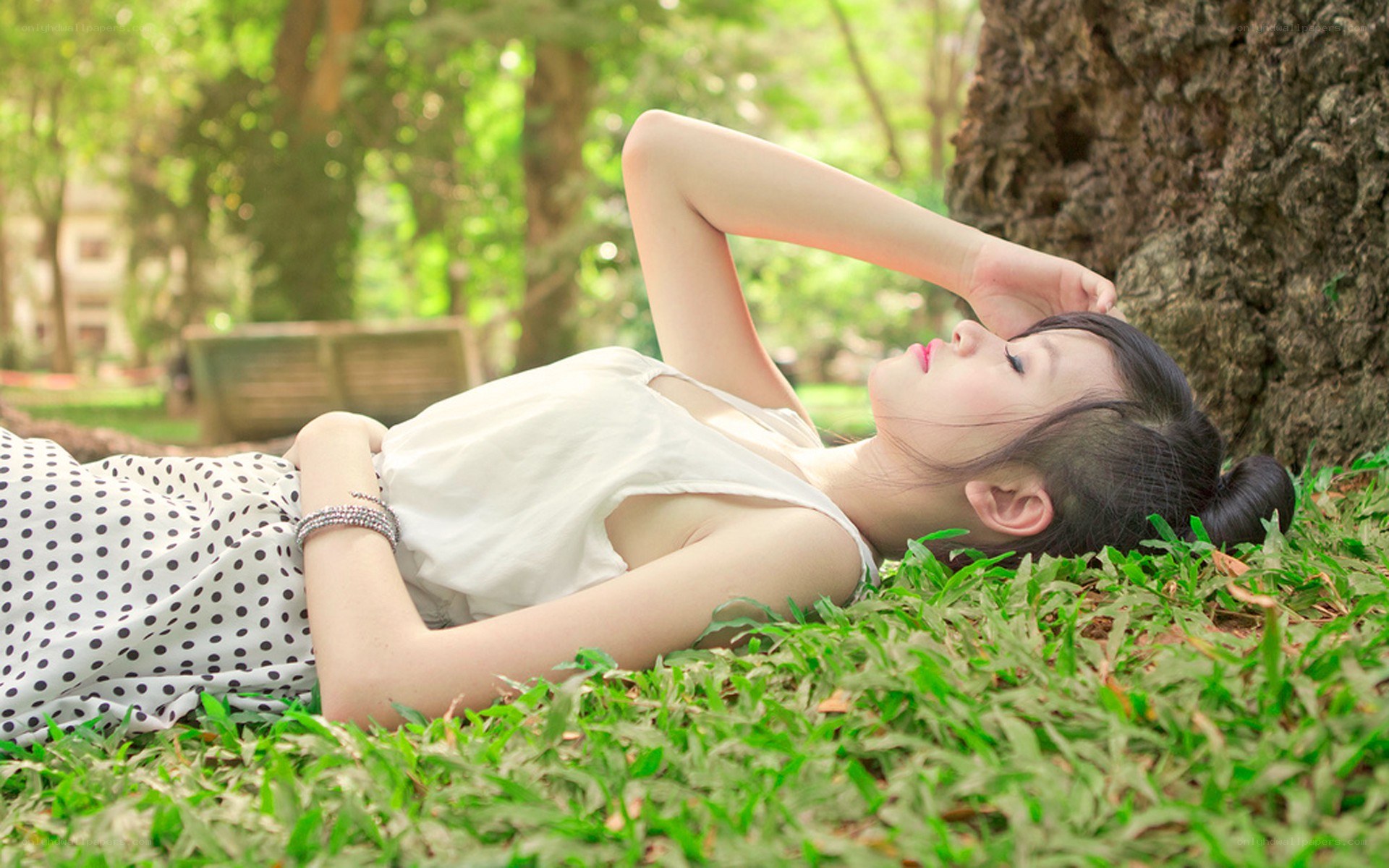 Woman resting on grass