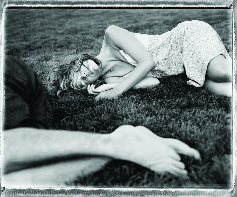 Woman resting on grass