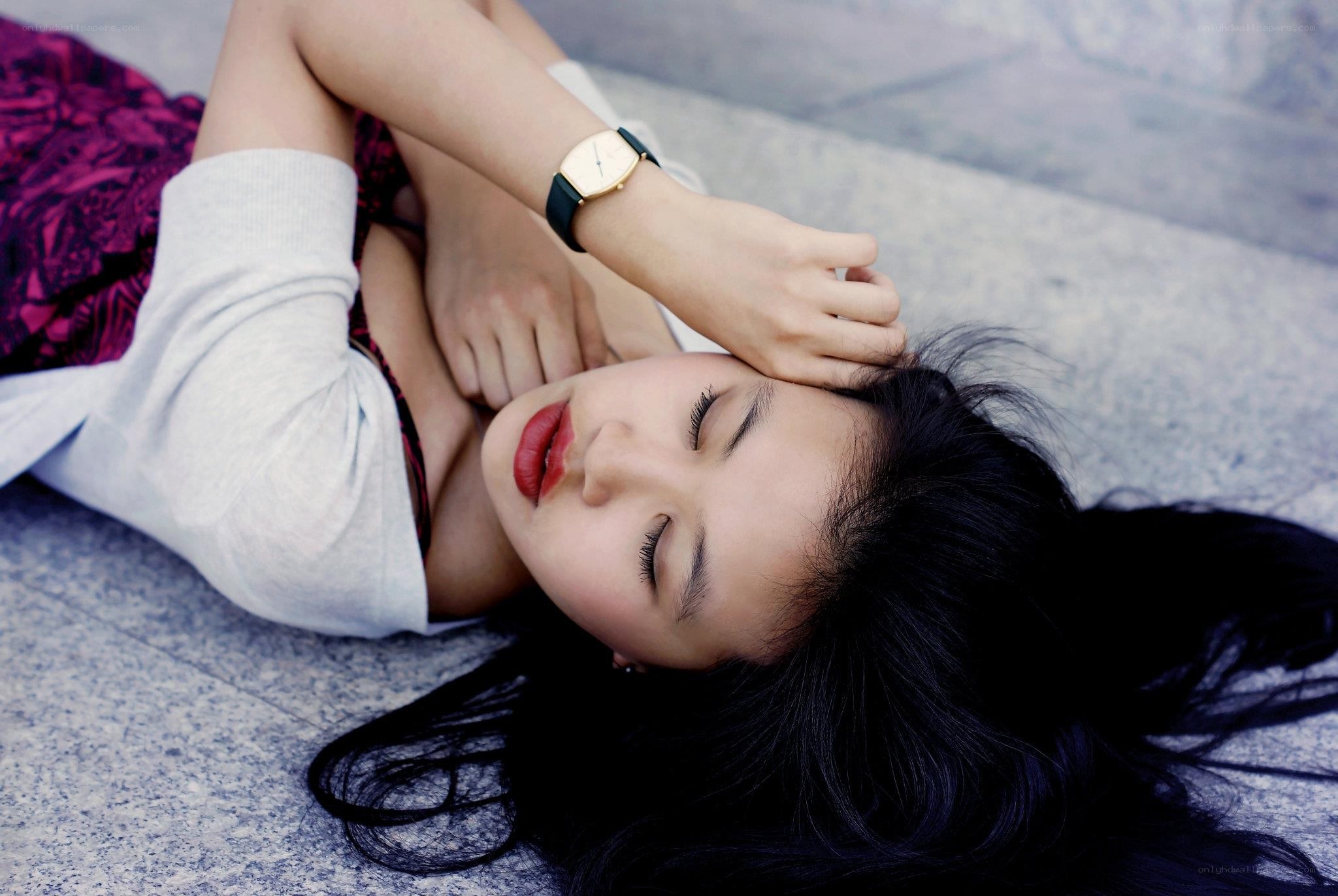 woman resting on ground