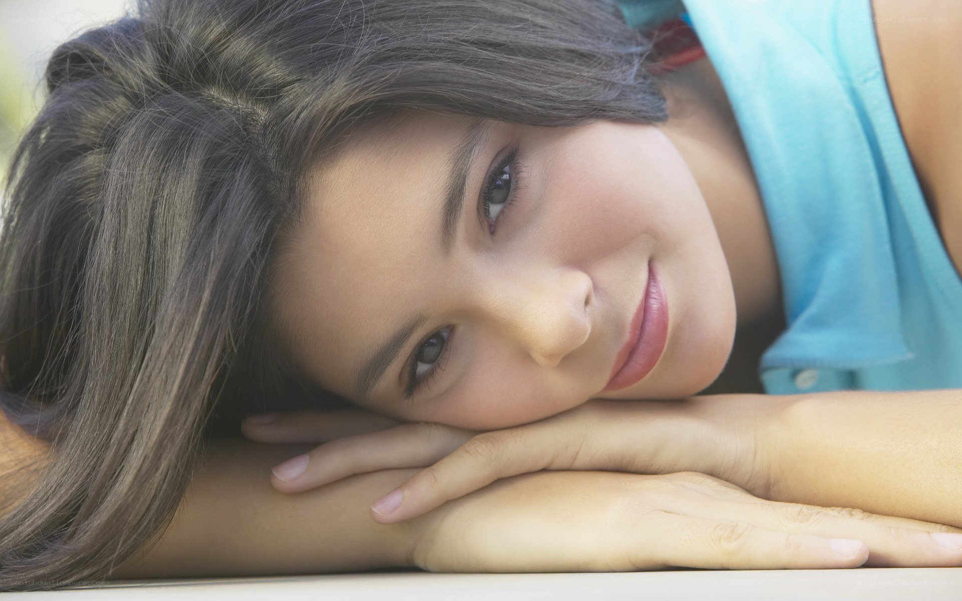 woman resting on hands
