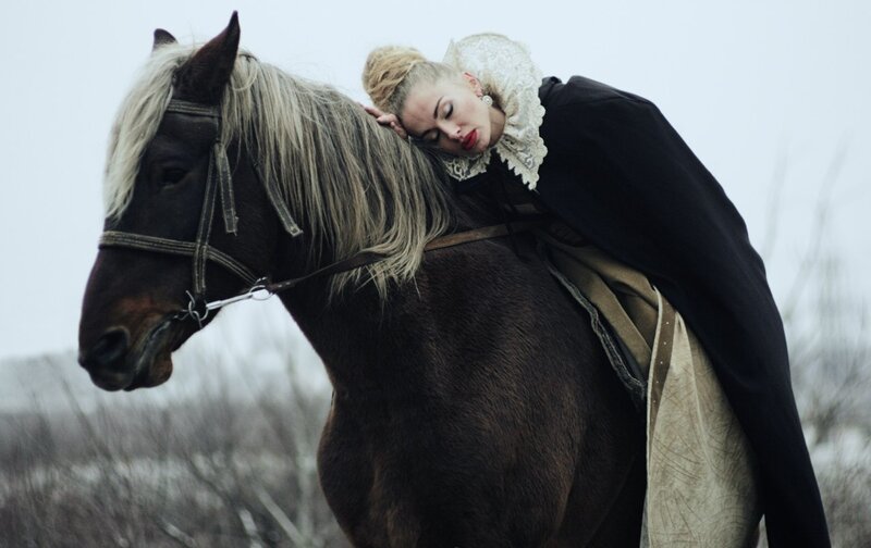 Woman Resting on Horse — Black