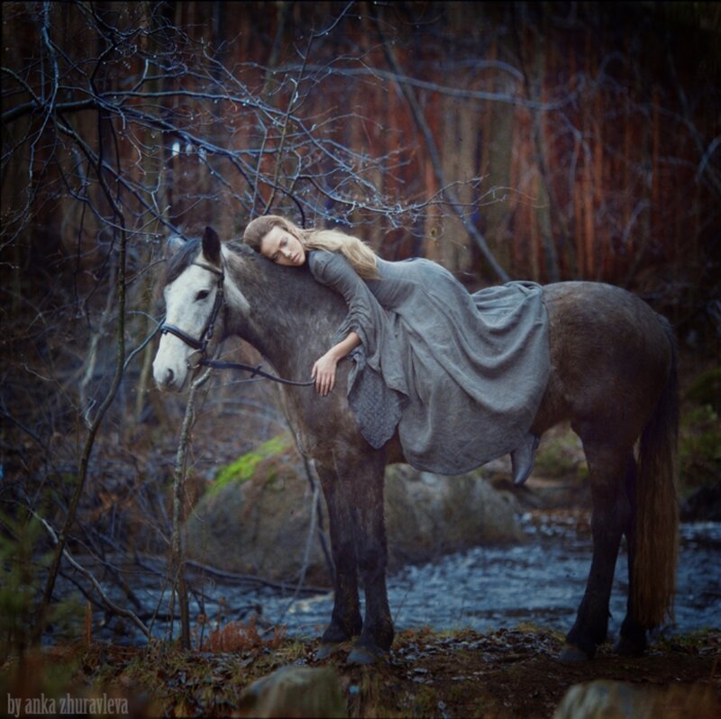 Woman Resting on Horse — Gray