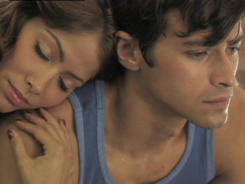 woman resting on man's shoulder