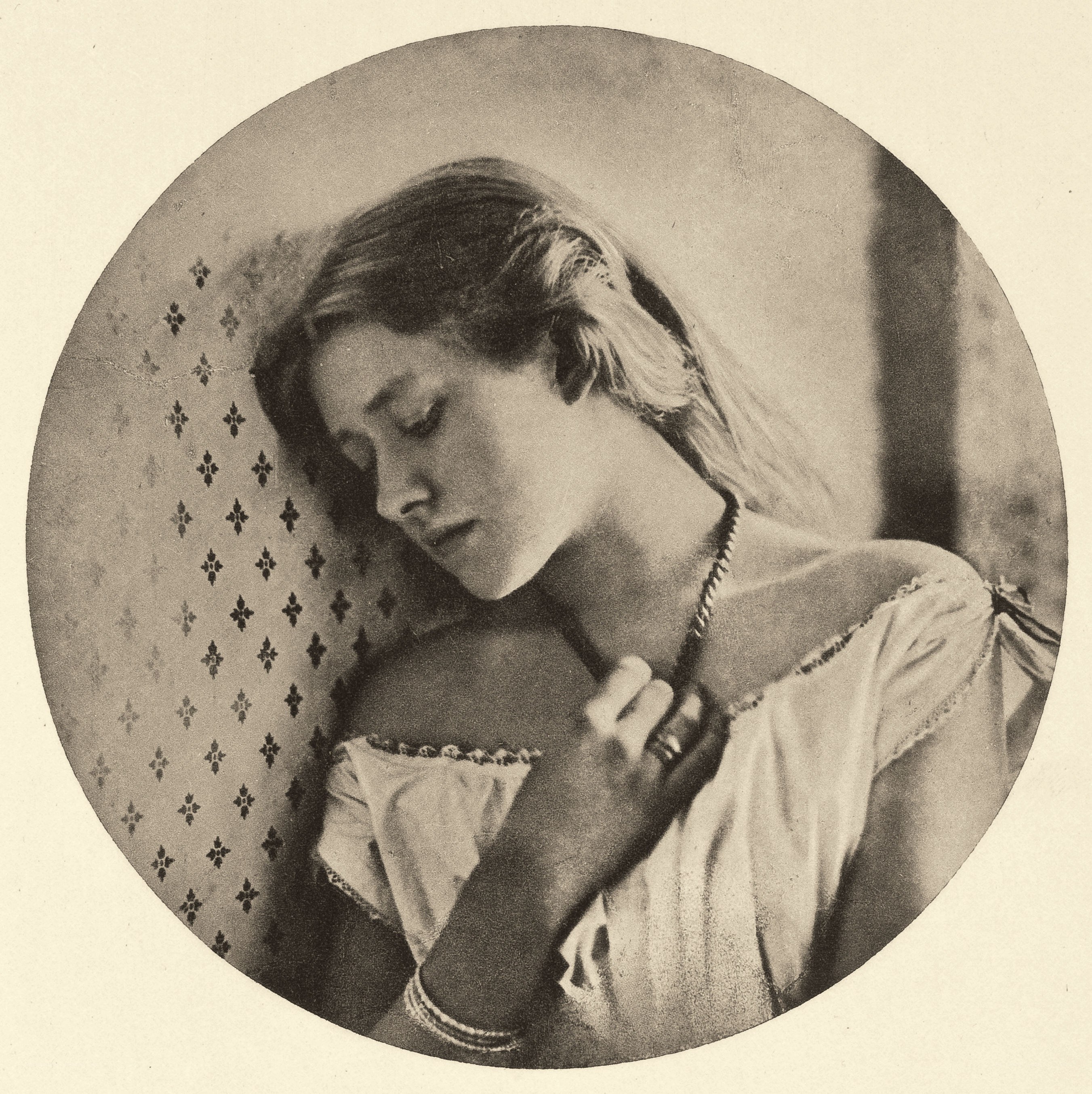 woman resting on patterned pillow