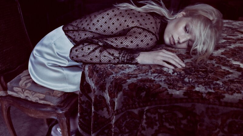 woman resting on patterned surface