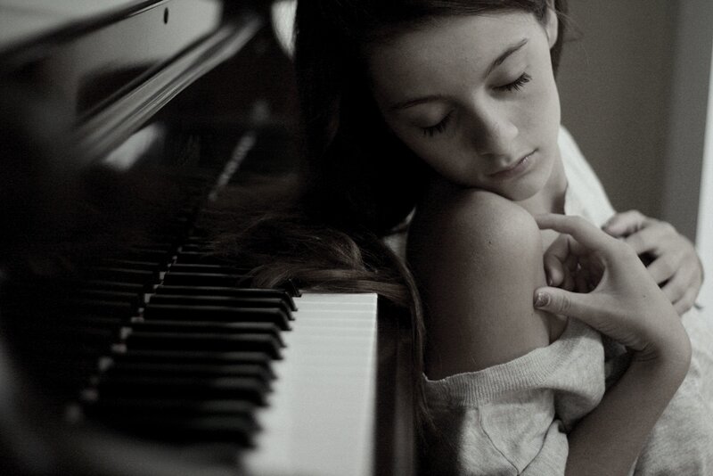 Woman Resting on Piano — Black