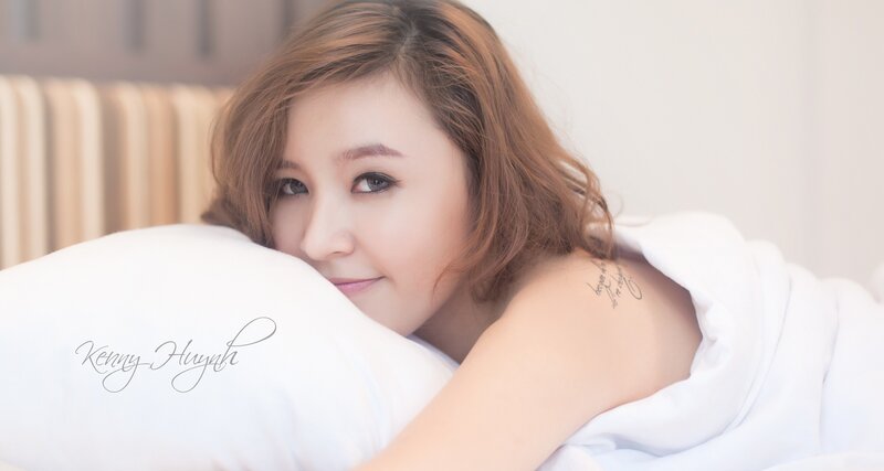woman resting on pillow