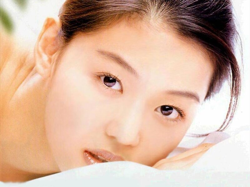 woman resting on pillow