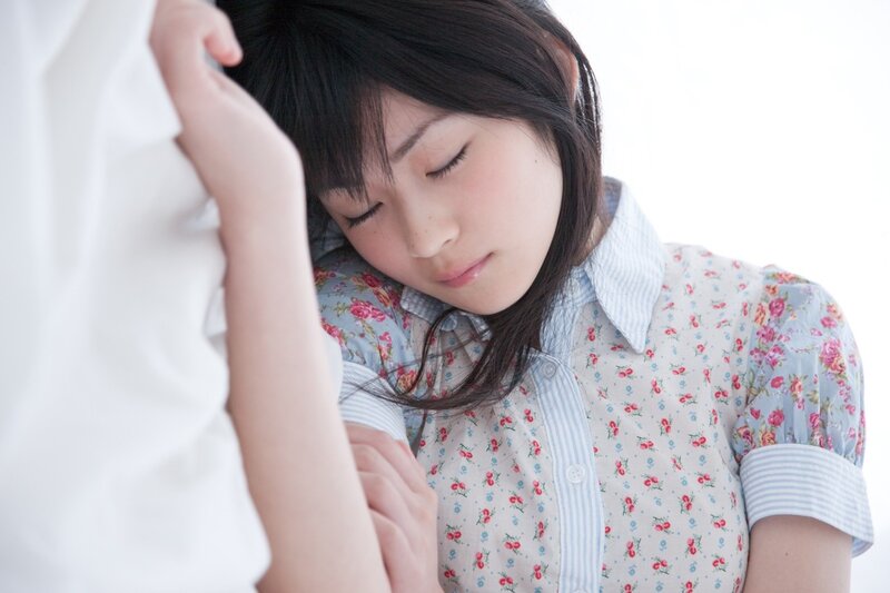 woman resting on shoulder