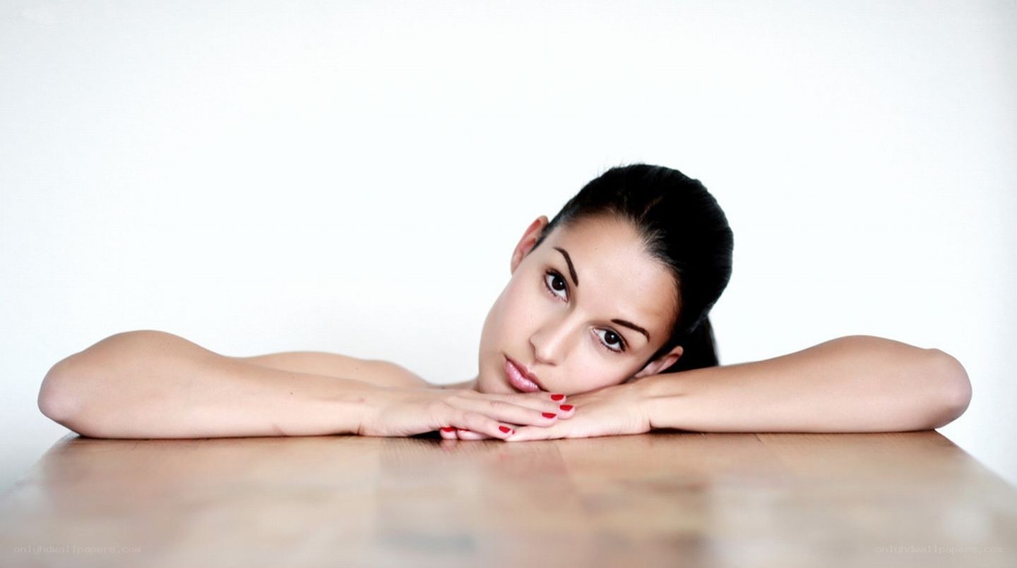 woman resting on table