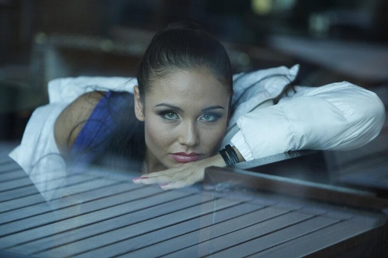 woman resting on table