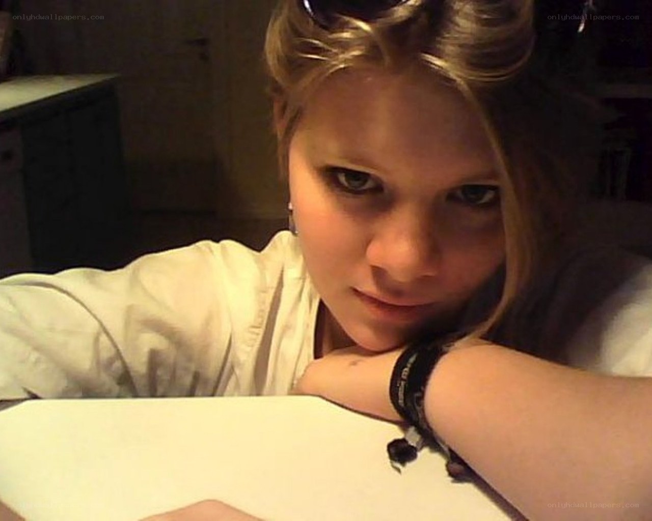 woman resting on table