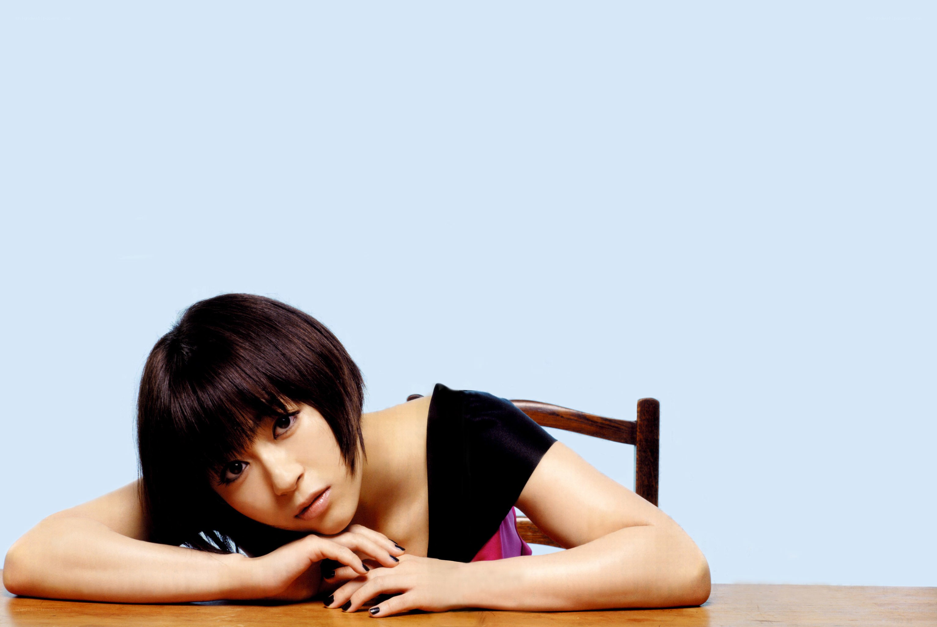 woman resting on table