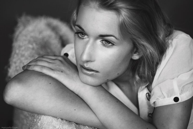 woman resting on teddy bear