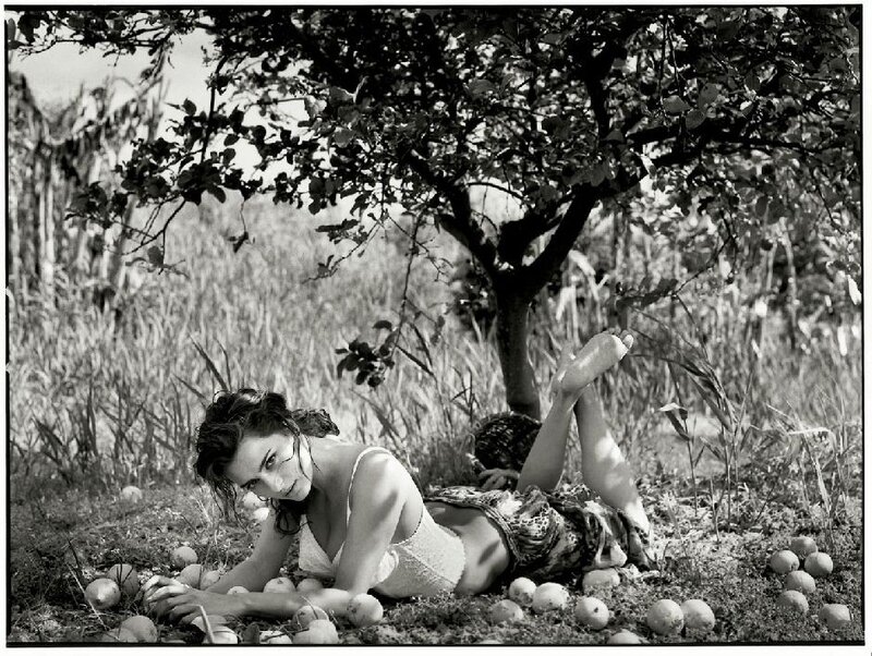 Woman resting under a tree
